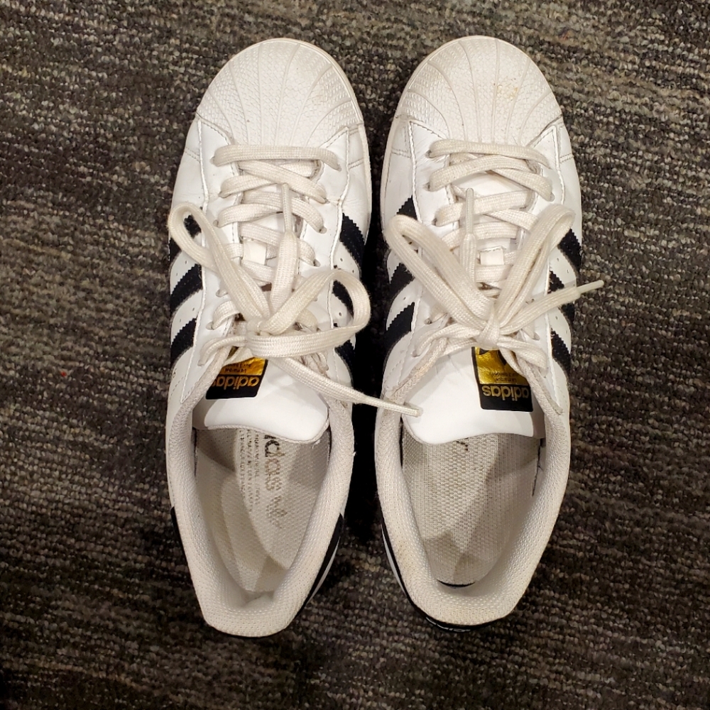 Black and white classic Adidas Superstar gold label men's size 8, women's 9.5